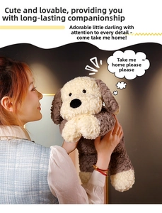 Detail view of a soft cream and brown puppy plush toy with fluffy sherpa texture