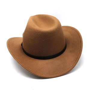 Detail view of camel felt cowboy hat featuring wide brim and black decorative band