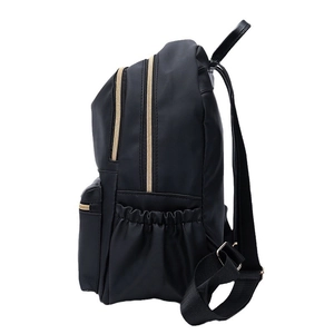 Minimalist black oxford fabric backpack with golden zippers and leather trim side view
