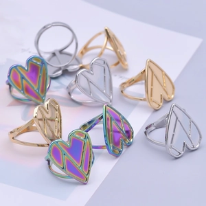 Adjustable hollow heart-shaped stainless steel rings in gold, silver and rainbow colors