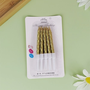 Pack of 5 gold spiral birthday candles with white holders on happy birthday card