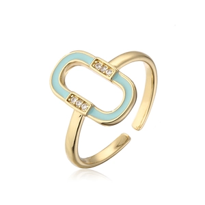 Detailed close-up of 18K gold plated ring with light blue enamel and zircon inlay