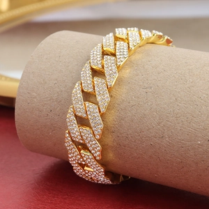 15mm diamond-encrusted golden Cuban chain necklace wrapped on a professional display stand