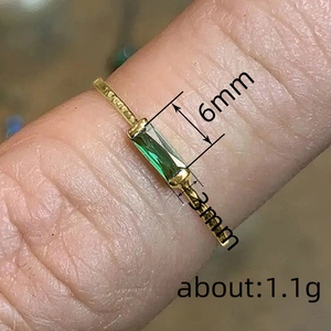 Minimalist gold ring with emerald green stone, 6mm x 3mm gem, weighing about 1.1g