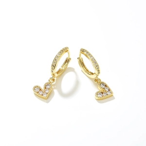 Minimalist gold heart earrings with sparkling cubic zirconia on a white background