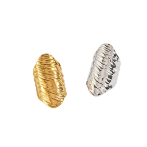 Unique textured hip-hop rings in gold and silver finish with wavy metallic patterns