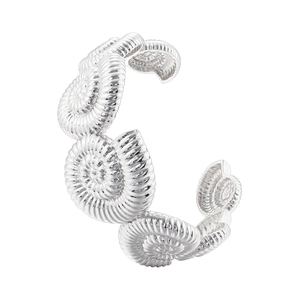 Detailed view of silver open cuff bracelet featuring a textured spiral nautilus shell design