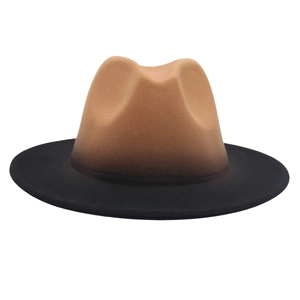 Close-up of wool felt fedora hat featuring a brown and black gradient transition