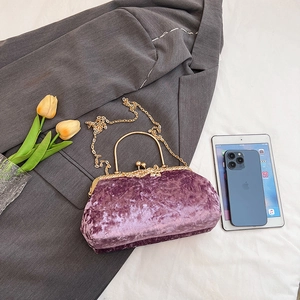Elegant purple velvet shell clutch bag with gold chain strap for party and evening use