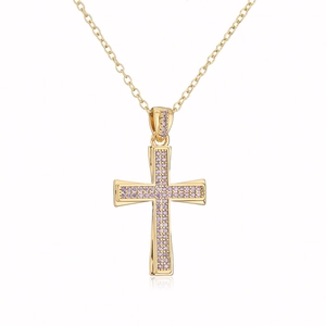 Detail of 18K gold plated cross necklace with purple zircon crystals on white background