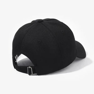 Detail view of the black cotton baseball cap showing adjustable strap and silver metal buckle