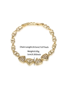 Detail view of gold geometric bracelet with chain length 19.5cm and triangle pendants