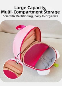 Detailed view of pink children's backpack interior with multi-compartment storage pockets