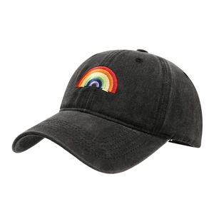 Washed cotton baseball cap with rainbow embroidery in a classic soft-top dad hat style