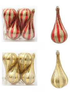 Detailed view of red and gold glitter teardrop Christmas ornaments in box packaging