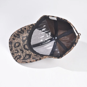 Internal view of the leopard print baseball cap with white care label and mesh texture