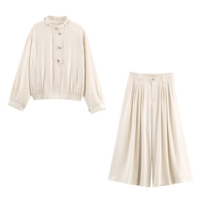 Set donna due pezzi color albicocca con giacca a collo alto e pantaloni a gamba larga