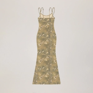 Detail of slim-fit maxi dress featuring dark marble tie-dye print and thin straps