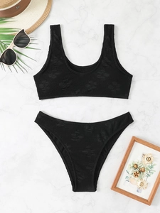 Black two-piece bikini with 3D bear jacquard texture and high-waist design