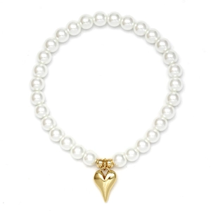Detail of white pearl bracelet with a golden heart charm on a clean white background