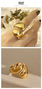 Polished gold adjustable open ring featuring dual teardrop shapes in modern style