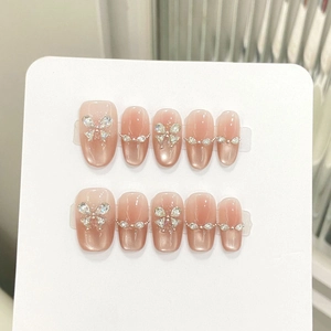 Cat eye cat's eye press-on nails with 3D crystal butterfly and shimmering glitter