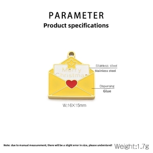 Macro view of a 16x15mm gold stainless steel Merry Christmas envelope charm with heart