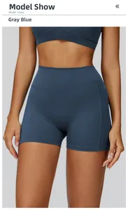 Close-up of high-waist grey blue yoga shorts with flattering ruched texture and soft fabric
