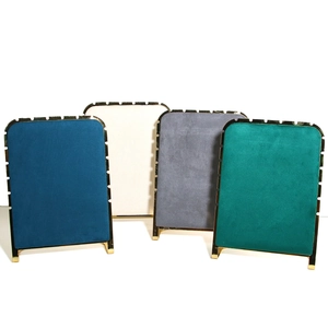 Luxury velvet jewelry display stands with gold metal frames for necklaces and bracelets