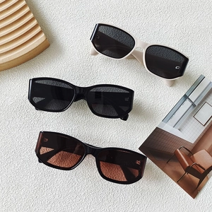 Retro oversized square sunglasses in cream, black, and brown colors for women