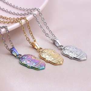 Macro shot of Mexican sugar skull pendants in rainbow, gold and silver on O-chains