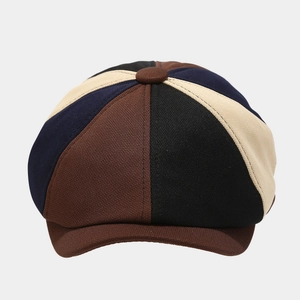 Retro multi-color patchwork newsboy cap with knitted texture in brown and blue
