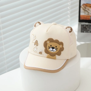 Detailed view of cream cotton kids baseball cap with 3D lion patch and cute ears