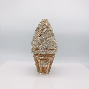Detailed close-up of sparkling crystal rhinestones on an ice cream cone clutch bag