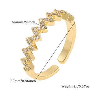 Detailed view of adjustable gold-plated zigzag ring with micro-paved cubic zirconia stones