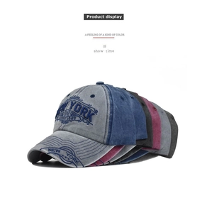 Detail showing vintage New York 3D embroidery on multi-color washed cotton baseball caps