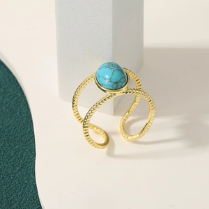 Adjustable gold plated multi-layer woven ring featuring a round turquoise stone inlay