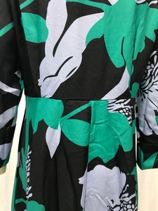 Close-up of high-waist A-line floral dress with green and white leaf digital print
