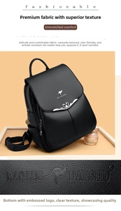 Detail of black leather backpack featuring anti-theft design and metallic heart emblem