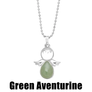 Macro detail of angel pendant featuring pear-shaped green aventurine gemstone