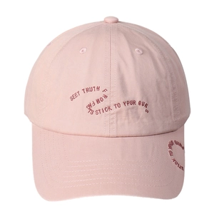Pink cotton baseball cap with red letter embroidery on a white background