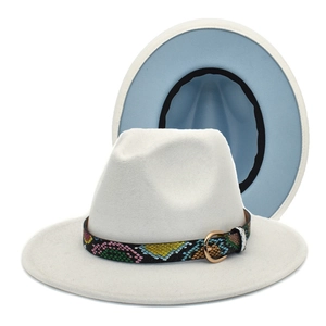 White fedora hat detail featuring colorful snake pattern belt and light blue inner lining