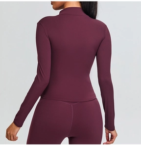 Rear view of slim fit wine red yoga set showing stitching detail and stand collar