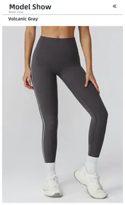 Detail view of high waist yoga leggings in volcanic gray with white side stripe accents