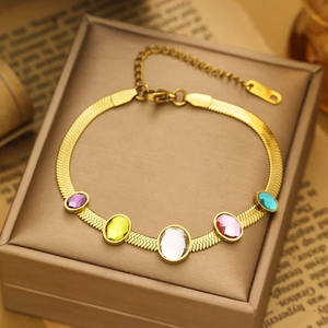 Detailed close-up of 18k gold-plated snake chain with five multi-colored zircon stones