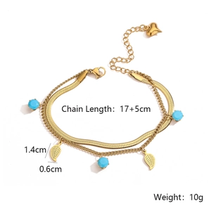 Detailed view of double-layer titanium steel bracelet with blue beads and leaf charms