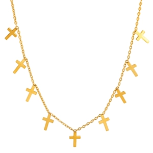 Detail view of a gold chain necklace featuring multiple dangling cross pendants