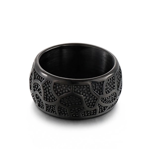 Vintage men's black stainless steel ring with embossed patterns and inner brushed finish
