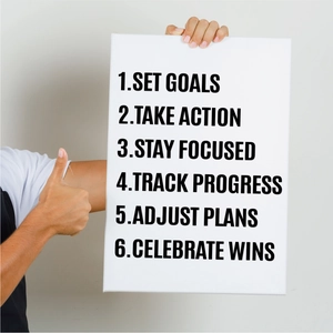 Macro detail of minimalist black and white vinyl inspirational goal setting art sticker