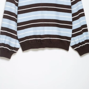 Relaxed fit crewneck knit sweater with mint and chocolate brown stripes on white background